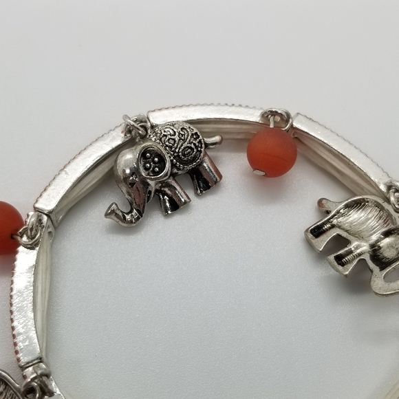 silver orange stretch bracelet with elephants - Picture 3 of 5